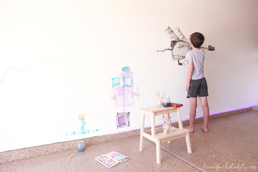 Have piles and piles of kids' doodles and artwork? This kids' art wall might be the answer for you. #montessori #homeschool #kids #painting #ideas #display #decor